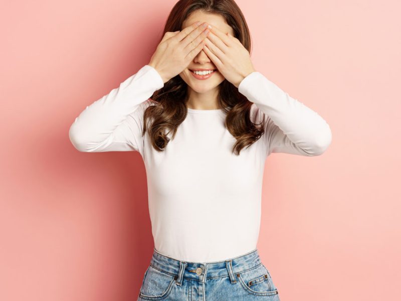 cute-happy-girl-waiting-surprise-with-closed-eyes-blindfolded-anticipating-presents-valentine